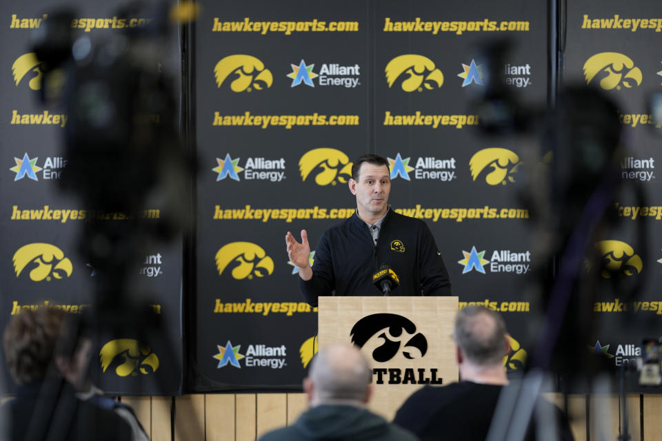 New Iowa offensive coordinator Tim Lester speaks during an NCAA college football news conference, Tuesday, Feb. 6, 2024, in Iowa City, Iowa. (AP Photo/Charlie Neibergall)