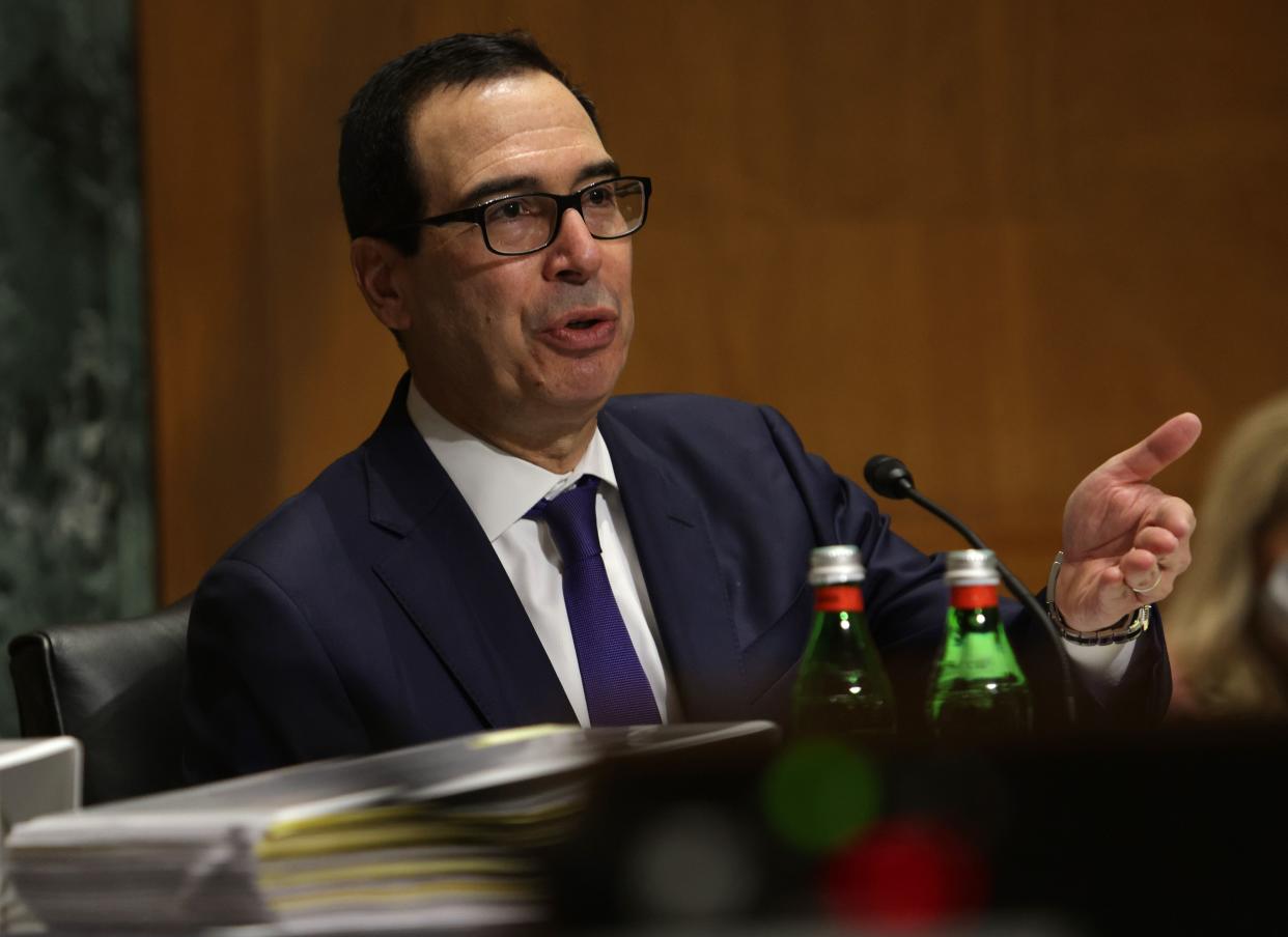 US Secretary of the Treasury Steven Mnuchin testifies during a hearing before the Congressional Oversight Commission on December 10, 2020 on Capitol Hill in Washington, DC. - The commission held a hearing on Examination of Loans to Businesses Critical to Maintaining National Security. (Photo by Alex Wong / POOL / AFP) (Photo by ALEX WONG/POOL/AFP via Getty Images)