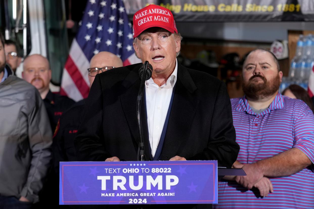 Former President Donald Trump has called on Republicans to protest his anticipated arrest. Trump is pictured here speaking in East Palestine, Ohio on Feb. 3.