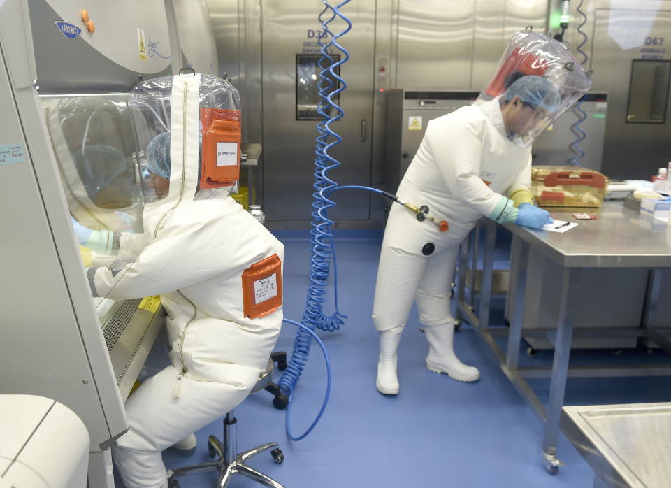 Researchers work in a lab of Wuhan Institute of Virology (WIV) in Wuhan, Hubei province, China. Source: AAP