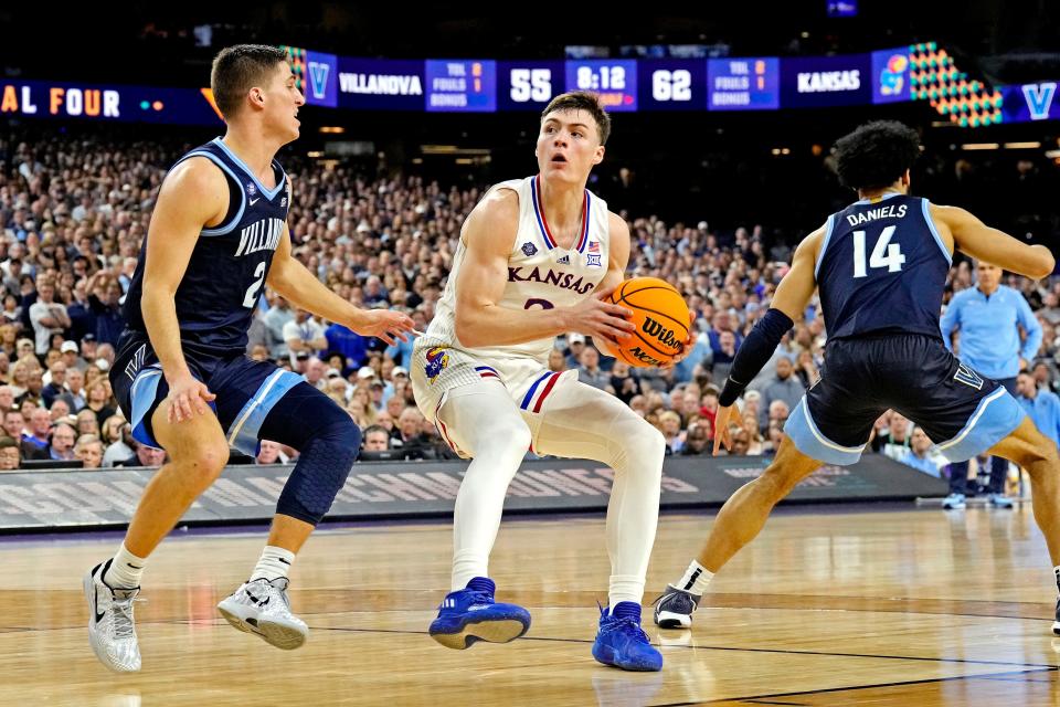 Kansas guard Christian Braun (2) drives to the basket against Villanova at the Final Four on April 2 in New Orleans. Braun's play there, and during the postseason, helped set him up for his professional career.