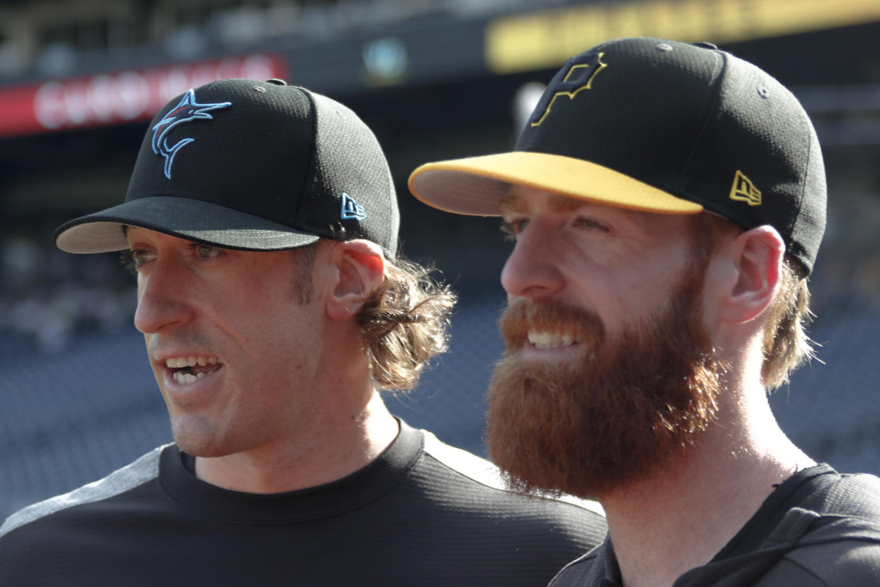 Brothers Brian Moran (left) and Colin Moran (right) made MLB history. (AP Photo/Keith Srakocic)