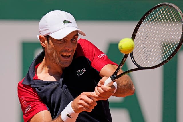 Pablo Andujar hits a backhand during his famous win