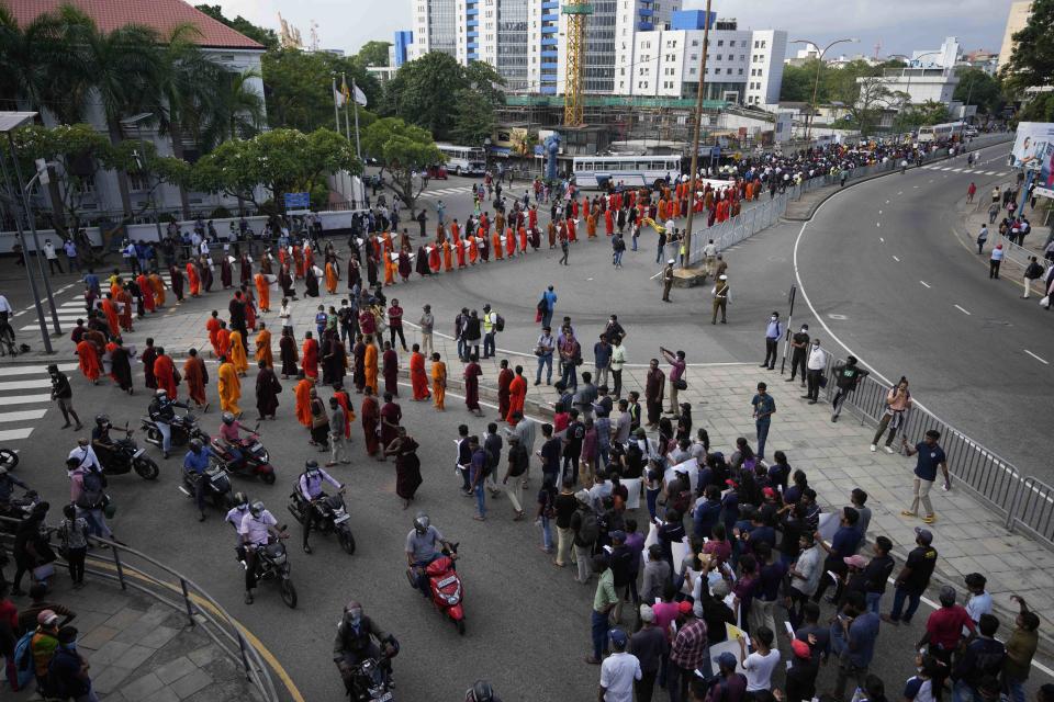 Sri Lankan university students march demanding President Gotabaya Rajapaksa resign over the economic crisis in Colombo, Sri Lanka, Monday, June 20, 2022. (AP Photo/Eranga Jayawardena)