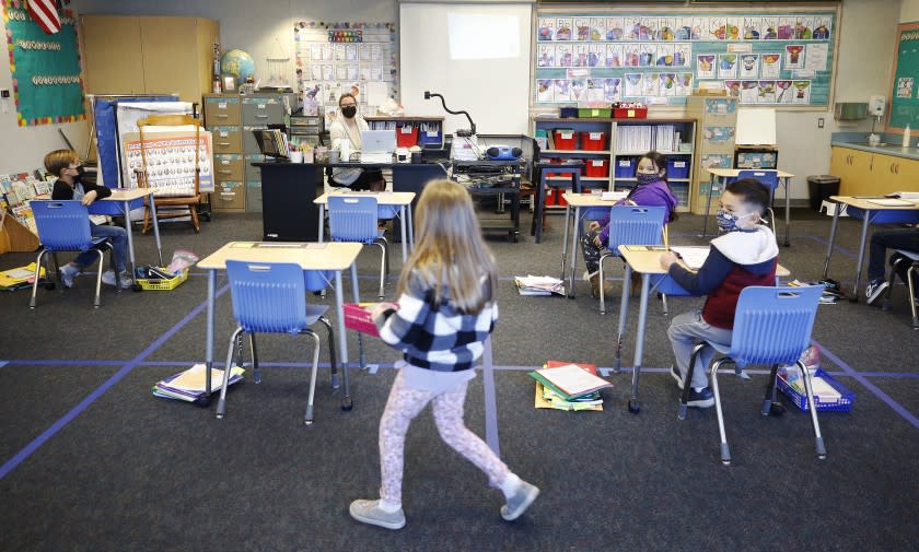 REDONDO BEACH, CA - FEBRUARY 02: The first grade classroom of teacher Courtney Meyer with desks separated for social distancing at Alta Vista Elementary School on the second day of classes as Redondo Beach Unified School district has welcomed back some of its K-2 students this week through a waiver. Alta Vista Elementary School on Tuesday, Feb. 2, 2021 in Redondo Beach, CA. (Al Seib / Los Angeles Times).