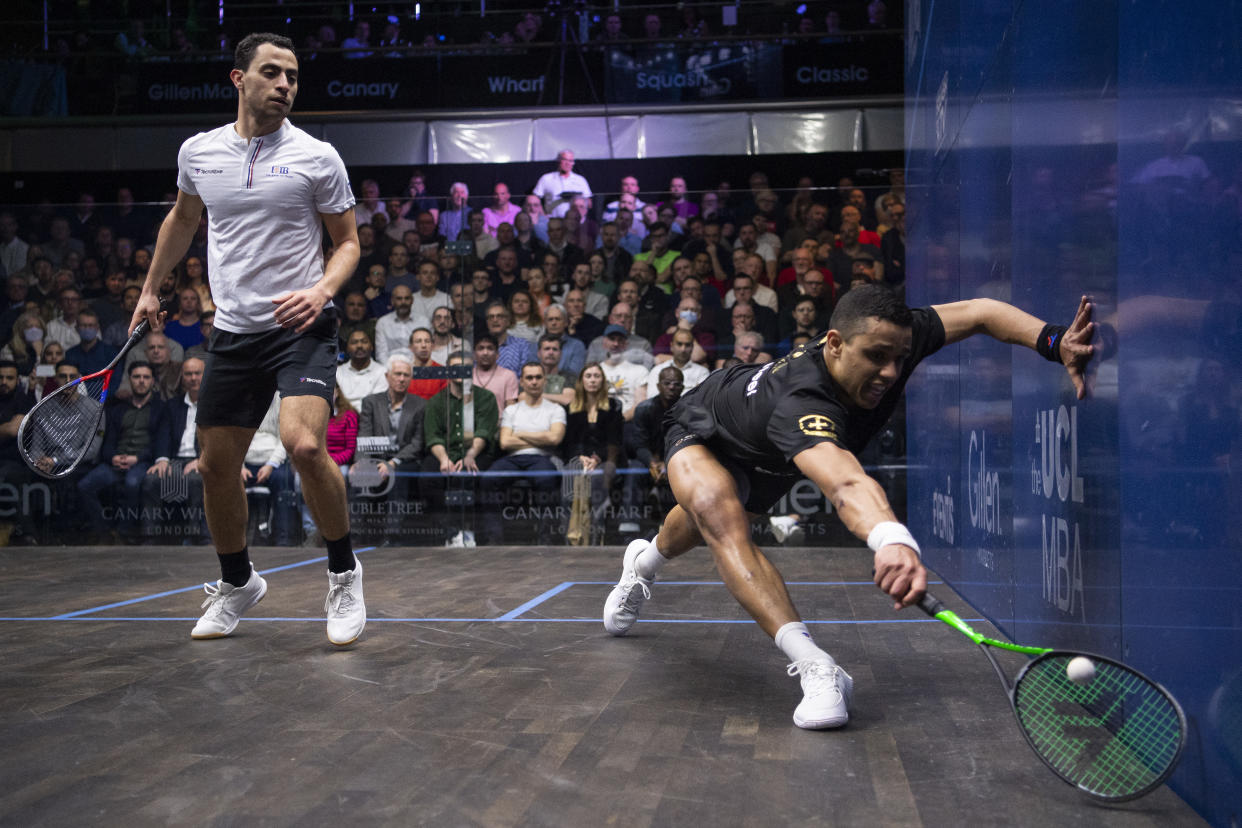 LONDON, ENGLAND - MARCH 18: Mostafa Asal of Egypt plays a shot during the The Canary Wharf Squash Classic Final against Fares Dessouky of Egypt at East Wintergarden on March 18, 2022 in London, England. (Photo by Justin Setterfield/Getty Images)