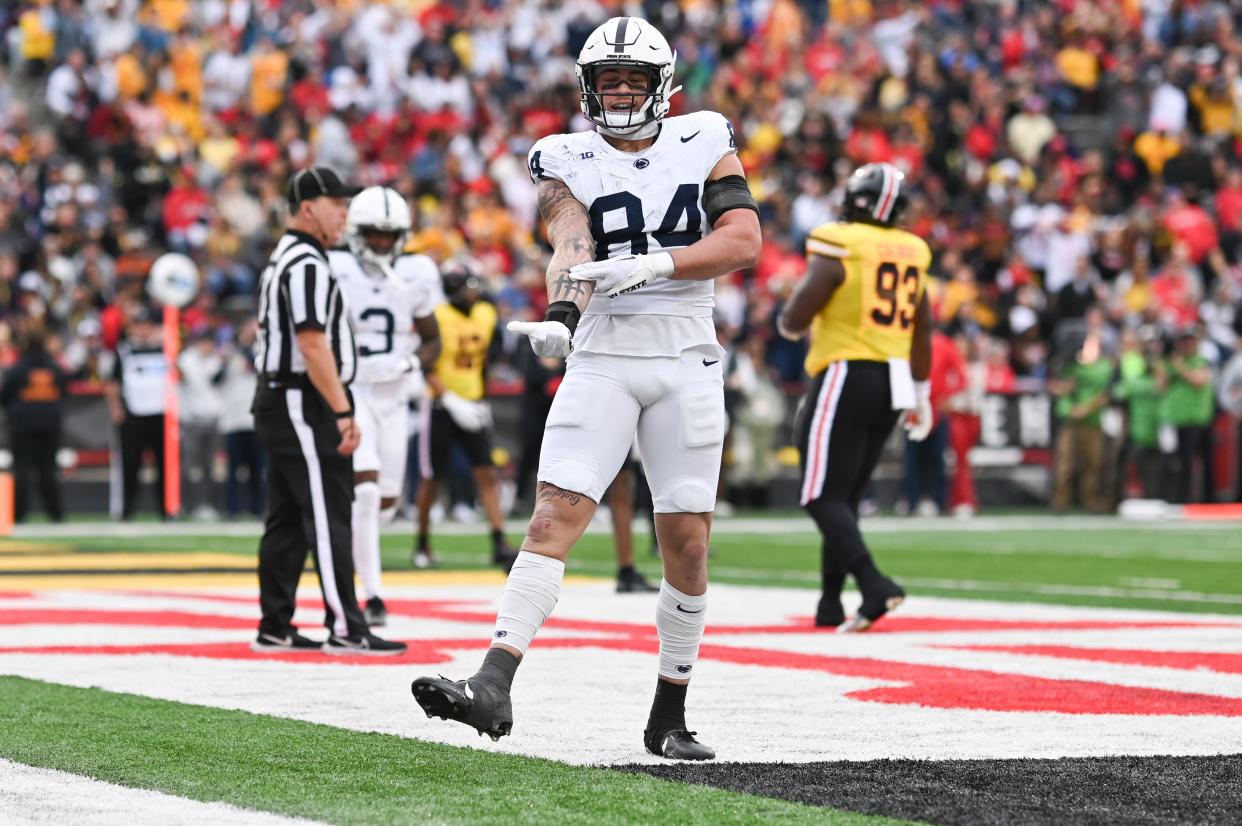Nov 4, 2023; College Park, Maryland, USA; Penn State Nittany Lions tight end Theo Johnson (84) reacts after catching a shovel pass for a touchdown during the first half against the Maryland Terrapins at SECU Stadium. Mandatory Credit: Tommy Gilligan-USA TODAY Sports