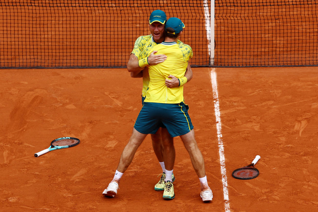 Matthew Ebden and John Peers, of Australia, celebrate after winning the gold medal against Austin Krajicek and Rajeev Ram, of the United States, after the men's doubles gold medal match on Saturday.