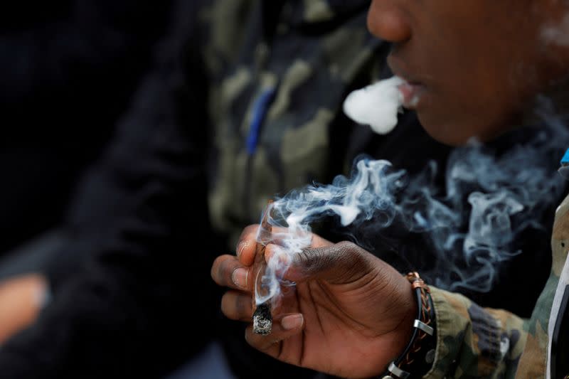 FILE PHOTO: People smoke marijuana on the informal cannabis holiday, 4/20, in Boston