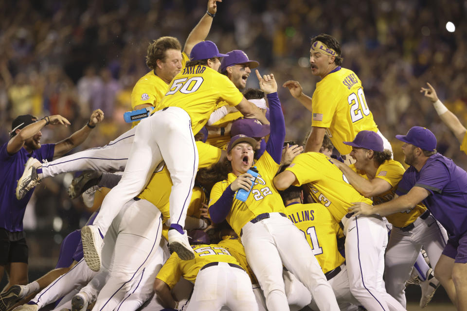 FILE - LSU celebrates after defeating Florida 18-4 in Game 3 to win the NCAA College World Series baseball final in Omaha, Neb., Monday, June 26, 2023. The NCAA baseball tournament opens Friday, May 31, 2024, with play in 16 double-elimination regionals.(AP Photo/Rebecca S. Gratz, File)