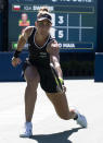 Beatriz Haddad Maia, of Brazil, hits a backhand during her win over Iga Swiatek, of Poland, during the National Bank Open tennis tournament Thursday, Aug. 11, 2022, in Toronto. (Chris Young/The Canadian Press via AP)