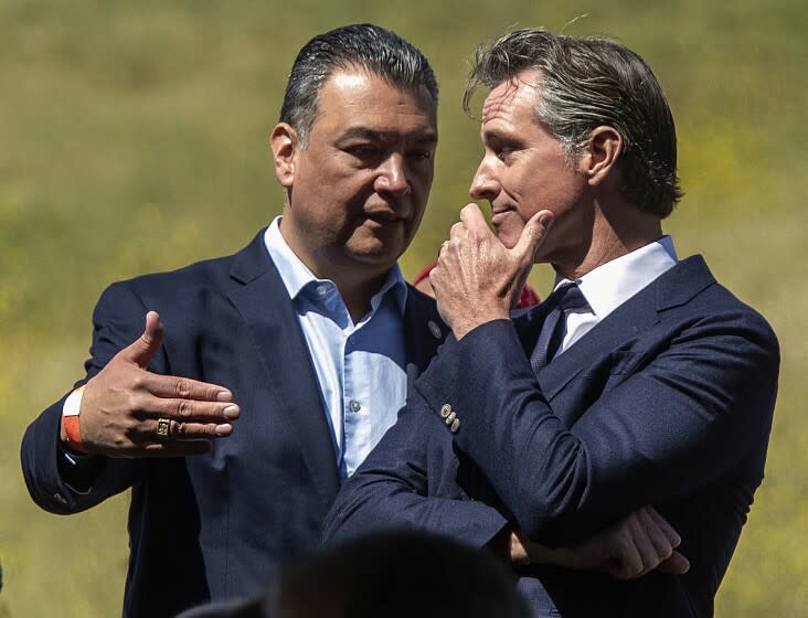 AGOURA HILLS, CA-APRIL 22, 2022: U.S. Senator Alex Padilla, left, and Governor Gavin Newsom attend the Wallis Annenberg Wildlife Crossing Groundbreaking Ceremony, held near the location of the future wildlife crossing in Agoura Hills. Spanning over ten lanes of the 101 freeway, when complete, the crossing will be the largest in the world, the first of its kind in California and a global model for urban wildlife conservation. (Mel Melcon / Los Angeles Times)