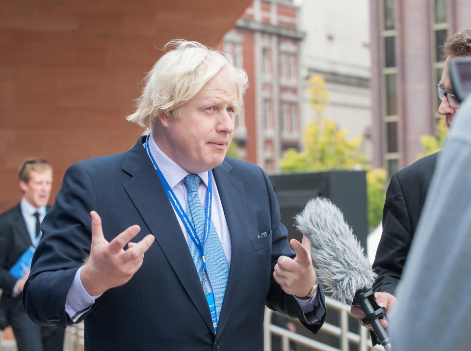 The Mayor of London Boris Johnson gives an interview outside Manchester Central during the Conservative Conference 2013.