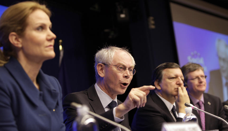 European Council President Herman Van Rompuy, second left, gestures while speaking during a media conference at an EU summit in Brussels on Thursday, March 1, 2012. European leaders meet for a two-day summit aimed at tackling unemployment and boosting economic growth in the region. From left, Denmark's Prime Minister Helle Thorning-Schmidt, European Commission President Jose Manuel Barroso and EU Commissioner for Employment Laszlo Andor. (AP Photo/Virginia Mayo)