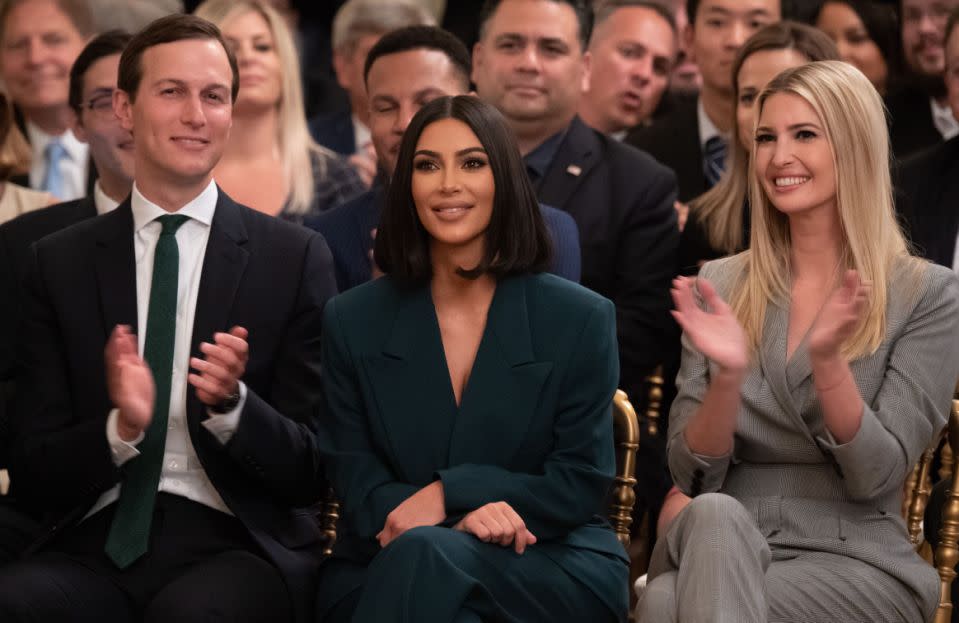 Kim Kardashian(C), Ivanka Trump(R) and Jared Kushner applaud as US President Donald Trump