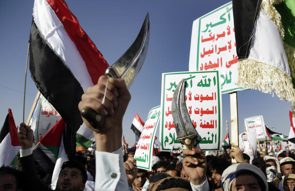 Houthi supporters attend a protest against the United States-led airstrikes on Friday, Jan 12, 2024, in Sanaa, Yemen. The U.S. and British militaries bombed more than a dozen sites used by the Iranian-backed Houthis. The military targets included air defense and radar sites, drone and missile storage and launching locations. (AP Photo)