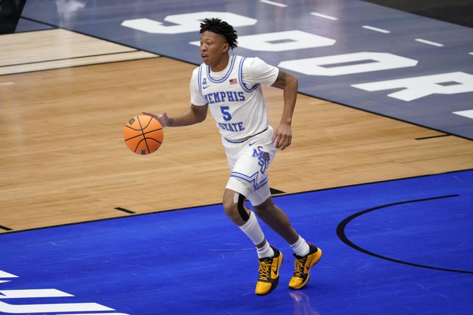 Boogie Ellis controls the ball during a game between Memphis State and Mississippi State during the NIT in March.