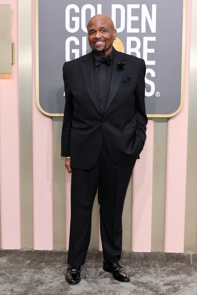 William Stanford Davis attends the 80th Annual Golden Globe Awards in a black suit