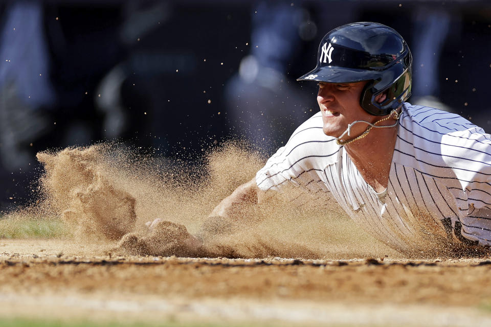 New York Yankees' Josh Donaldson scores against the Tampa Bay Rays during the seventh inning of the team's baseball game on Saturday, Sept. 10, 2022, in New York. (AP Photo/Adam Hunger)