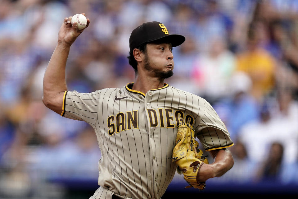 San Diego Padres starting pitcher Yu Darvish throws during the first inning of a baseball game against the Kansas City Royals Saturday, Aug. 27, 2022, in Kansas City, Mo. (AP Photo/Charlie Riedel)