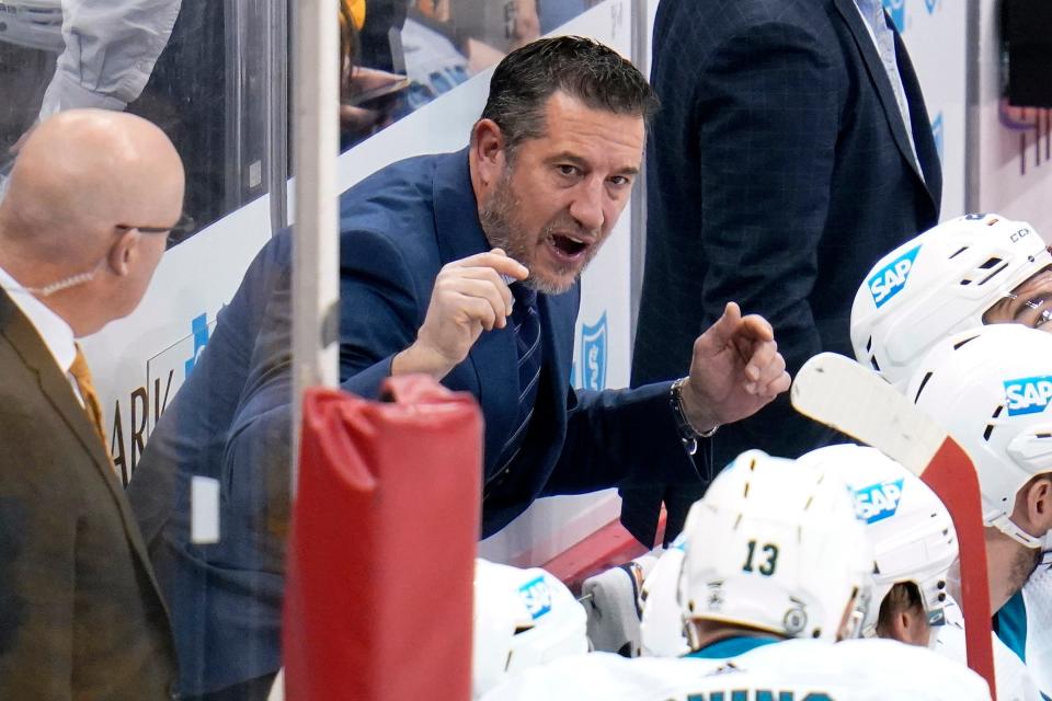 San Jose Sharks head coach Bob Boughner gives instructions during the first period of an NHL hockey game against the Pittsburgh Penguins in Pittsburgh on Sunday, Jan. 2, 2022.