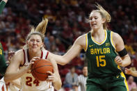 Iowa State guard Ashley Joens, left, grabs a rebound in front of Baylor forward Lauren Cox, right, during the first half of an NCAA college basketball game, Sunday, March 8, 2020, in Ames, Iowa. (AP Photo/Charlie Neibergall)