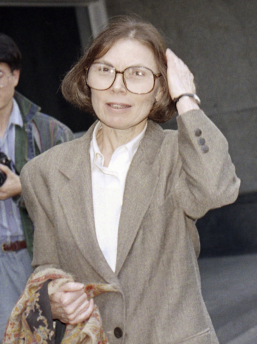 FILE - The New Yorker writer Janet Malcolm leaves the Federal Courthouse in San Francisco on June 3, 1993 in the suit trial brought by psychoanalyst Jeffrey Masson, who claims he was misquoted and libeled in a 1983 magazine article. Malcolm, the inquisitive and boldly subjective author and reporter known for her challenging critiques of everything from murder cases and art to journalism itself, has died. She was 86. Malcolm's death was confirmed Thursday by a spokesperson for The New Yorker, where Malcolm was a longtime staff writer. (AP Photo/George Nikitin, File)