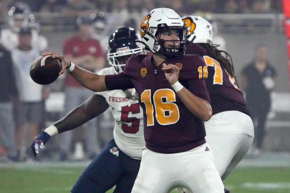 Arizona State quarterback Trenton Bourguet (16) passes the ball against Fresno State during the first half of an NCAA college football game Saturday, Sept. 16, 2023, in Tempe, Ariz. (AP Photo/Rick Scuteri)