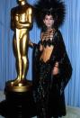 <p>For one of her most memorable and iconic red carpet looks of all time, Cher wore a sparkling showgirl-inspired two-piece set and towering headpiece by Bob Mackie to the Oscars because the Academy didn't take her as a serious actress. </p>