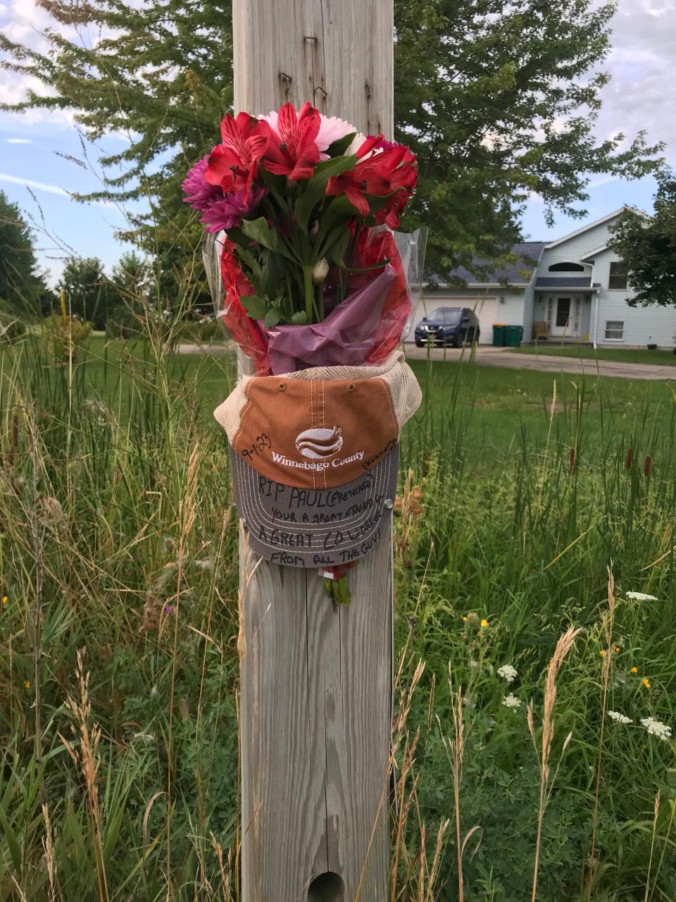 Co-workers of Winnebago County Highway Foreman Paul Delap have erected a memorial with a county hat after Paul and his wife Pam Delap were killed in a motorcycle crash in Fond du Lac County on Sept. 1, 2023.