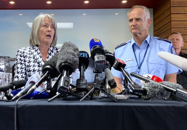 Coroner Deborah Marshall and acting assistant police commissioner Bruce Bird address a press conference in Whakatane, New Zealand (Nick Perry/AP)