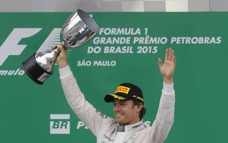 Mercedes Formula One driver Nico Rosberg of Germany celebrates after winning the Brazilian F1 Grand Prix in Sao Paulo, Brazil, November 15, 2015. REUTERS/Paulo Whitaker