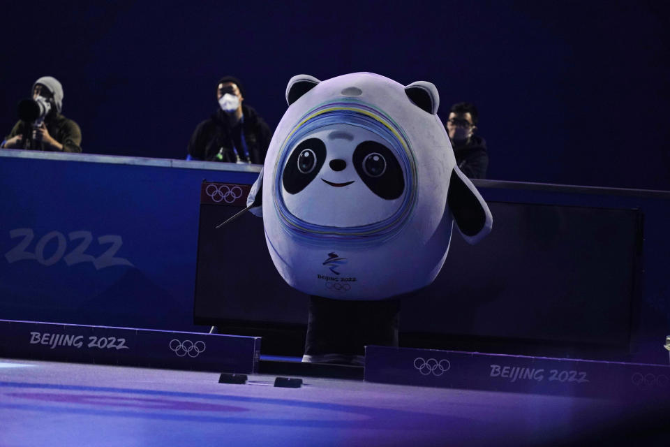 Bing Dwen Dwen, the mascot of the 2022 Winter Olympics, is seen at the curling venue at the Beijing Winter Olympics Friday, Feb. 18, 2022, in Beijing. (AP Photo/Brynn Anderson)