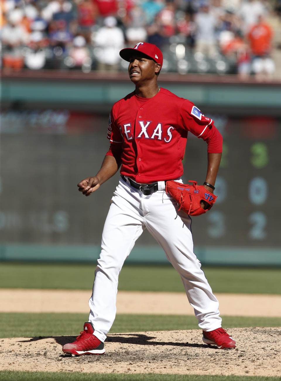 Texas Rangers pitcher Jose Leclerc reacts to a called ball against the Houston Astros during the ninth inning of a baseball game Sunday, April 21, 2019, in Arlington, Texas. (AP Photo/Mike Stone)