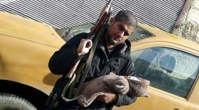 'Jihadi Sid' Abu Rumaysah in the Middle East with his infant son.