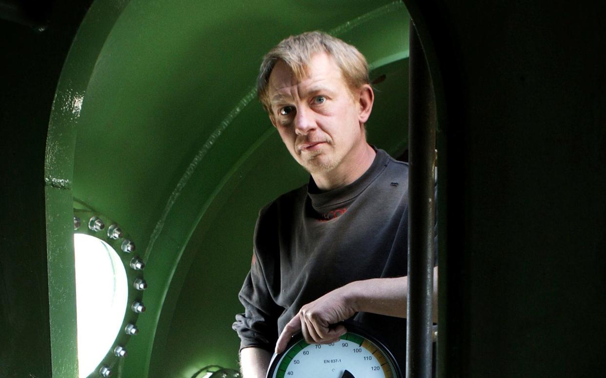 In this April 30, 2008 photo, submarine owner Peter Madsen stands inside the vessel - Ritzau Foto