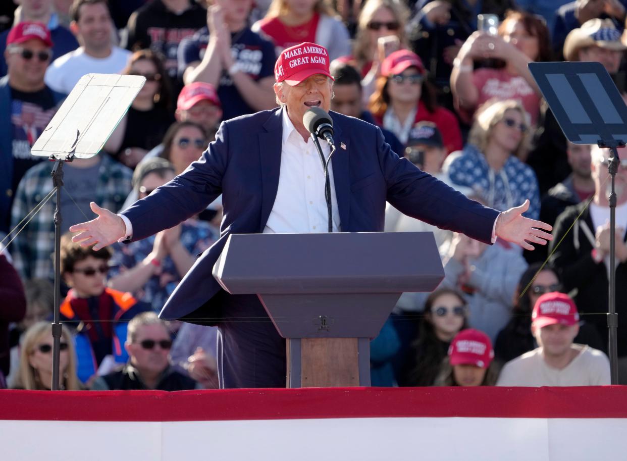 Former President Donald Trump campaigns at the Dayton International Airport on March 16, 2024, in Ohio. Trump began the rally by saluting while a recording of "Justice for All" by the J6 Prison Choir played. The recording features defendants accused of crimes stemming from the Jan. 6, 2021 storming of the U.S. Capitol singing the National Anthem while Trump says the Pledge of Allegiance.