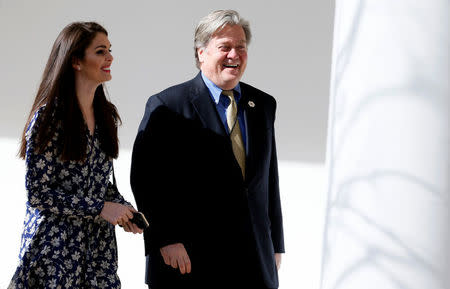 White House chief strategist Steve Bannon and White House director of strategic communications Hope Hicks walk along the colonnade ahead of a joint press conference by Japanese Prime Minister Shinzo Abe and President Donald Trump at the White House in Washington, February 10, 2017. REUTERS/Jim Bourg