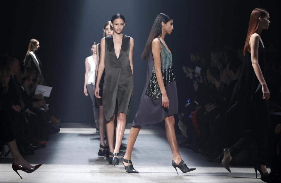 Models walk the runway during the showing of the Narciso Rodriguez Fall 2014 collection at Fashion Week in New York, Tuesday, Feb. 11, 2014. (AP Photo/Kathy Willens)