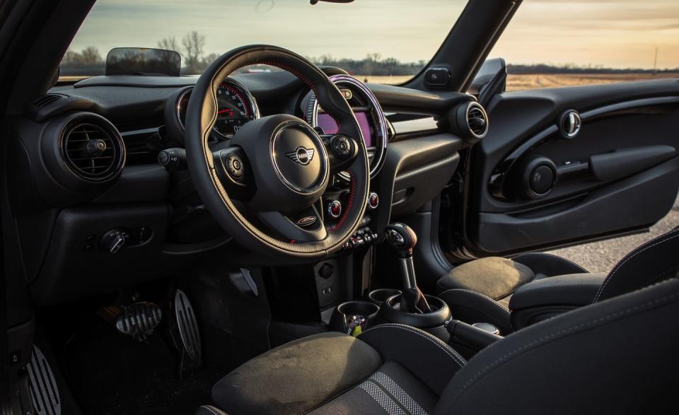 <p>The Mini's interior materials also are relatively nice for this class, and its interior design is funky without being impractical. The toggle switches under the center stack for the ignition, stability control, and drive modes have a more satisfying tactility than regular buttons.</p>