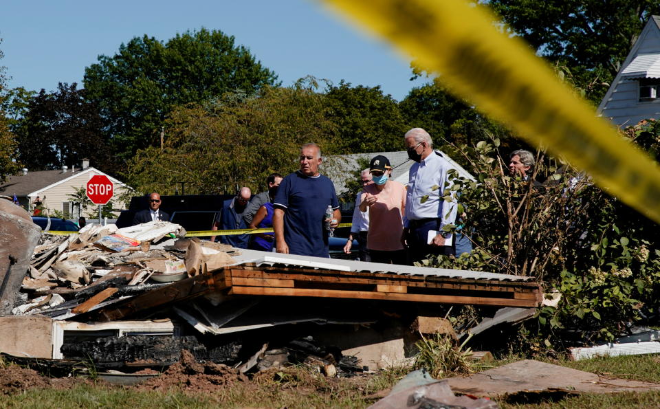 U.S. President Joe Biden tours the Lost Valley neighborhood in Manville that was impacted by Hurricane Ida, New Jersey, U.S., September 7, 2021. REUTERS/Elizabeth Frantz