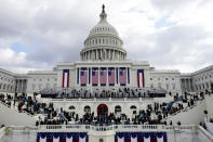 Congressional members and guests arrive for the 59th Presidential Inauguration at the U.S. Capitol in Washington, Wednesday, Jan. 20, 2021. (AP Photo/Patrick Semansky, Pool)