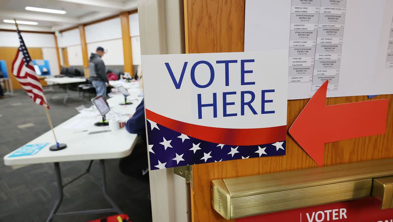 Signs show voters where to go on Election Day at Whitmore Library in Cottonwood Heights on Tuesday, Nov. 8, 2022.