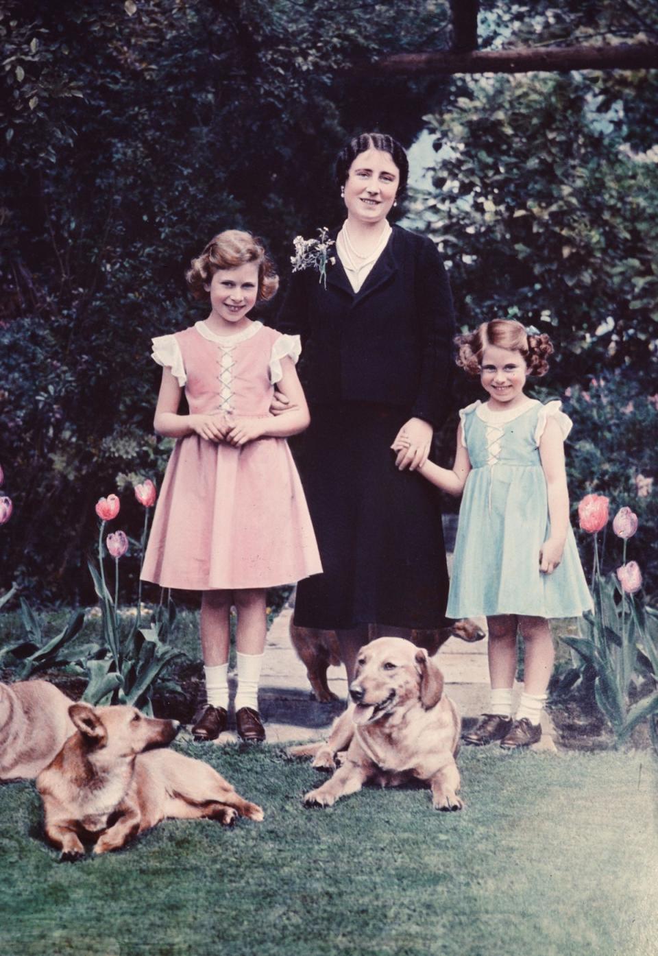 Princesses Elizabeth and Margaret in the garden of the Royal Lodge (Getty Images)