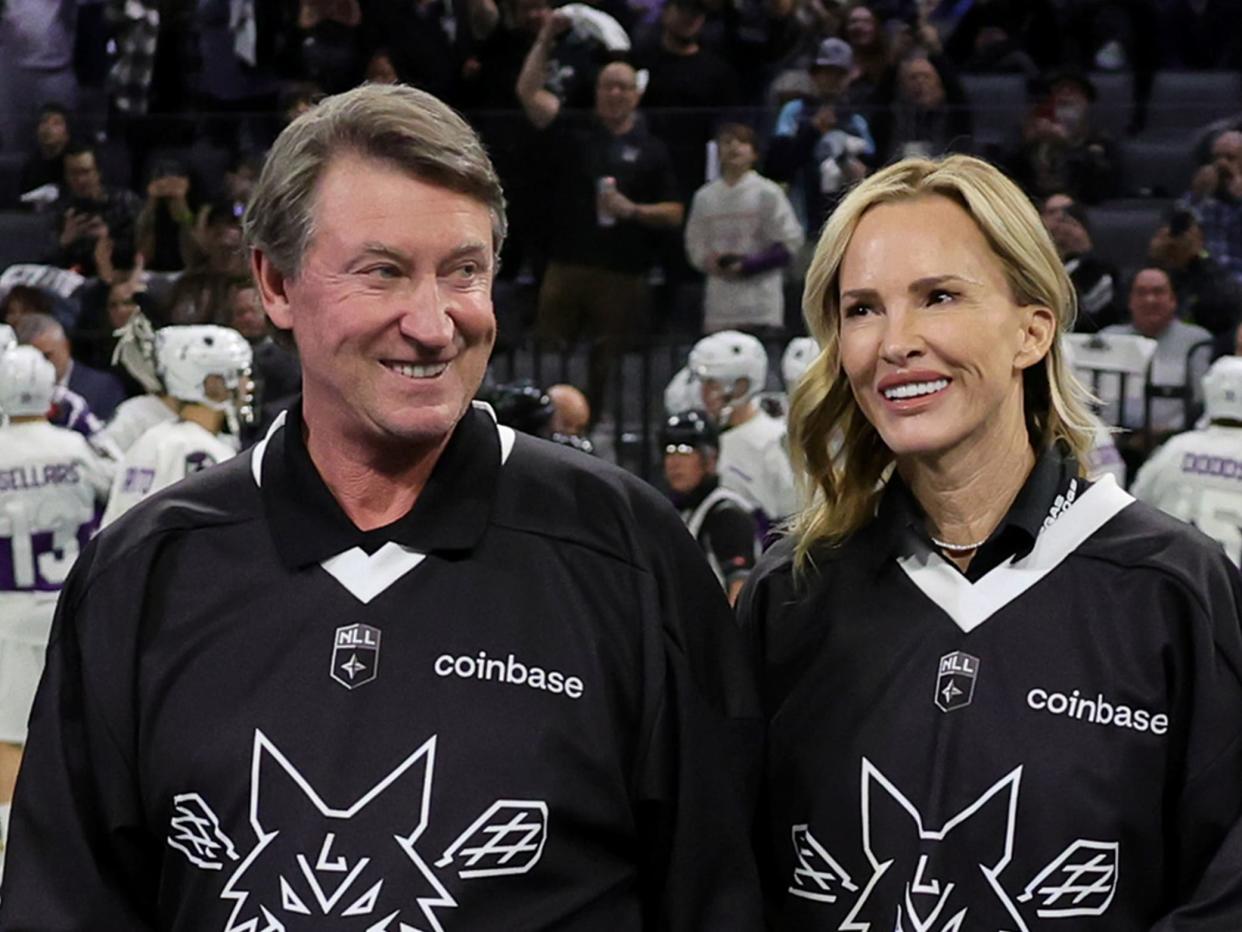 Wayne Gretzky and wife Janet Jones Gretzky are introduced before the Desert Dogs' inaugural regular-season home opener against the Panther City Lacrosse Club at Michelob ULTRA Arena on Dec. 16, 2022 in Las Vegas. Panther City defeated the Desert Dogs 9-3. (Photo by Ethan Miller/Getty Images for National Lacrosse League)