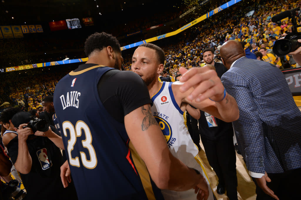 It is exceedingly unlikely that the next time Anthony Davis and Stephen Curry embrace after a game, they will be wearing the same uniform. (Getty)