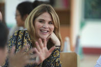 Jenna Bush Hager waves at students at Can Giuoc high school in Long An province, Vietnam Monday, Dec. 9, 2019. Bush Hager is accompanying U.S. former first lady Michelle Obama on a trip to Vietnam to promote education for adolescent girls. (AP Photo/Hau Dinh)