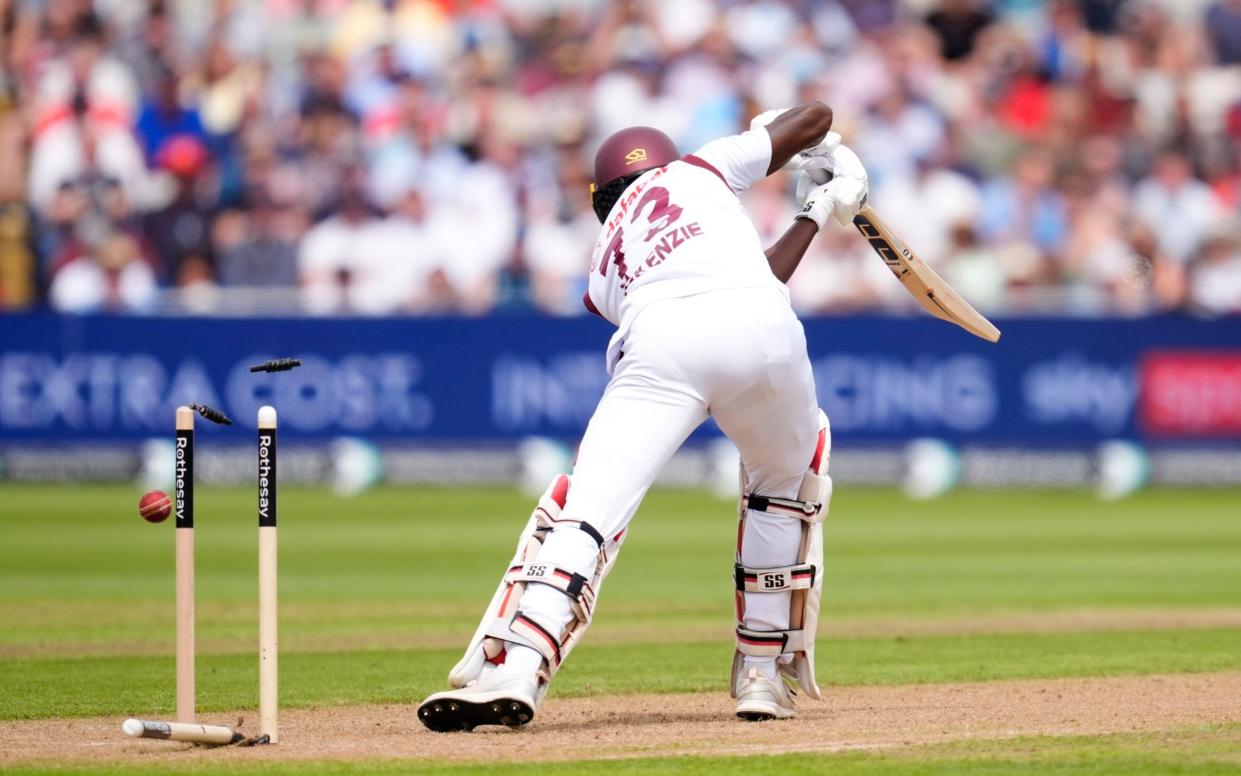 West Indies' Kirk McKenzie is dismissed by England's Mark Wood