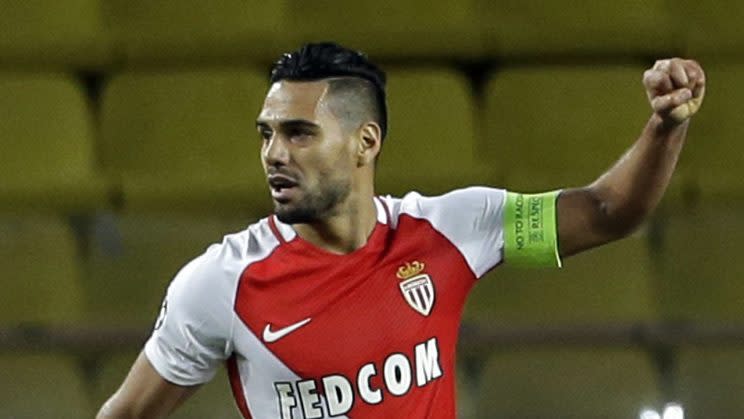 FILE - In this Wednesday Nov. 2, 2016 file photo, Monaco's Radamel Falcao celebrates after scoring during the Champions League Group E soccer match between Monaco and CSKA at the Louis II stadium in Monaco. French league leader Monaco continued its rampant scoring form as Radamel Falcao netted a hat-trick in a 4-0 win away to Bordeaux on Saturday, Dec. 10. The win moved the Principality side to the top of the league on goal difference - with the emphasis emphatically on goals: 53 in 17 league games so far. (AP Photo/Claude Paris, file)
