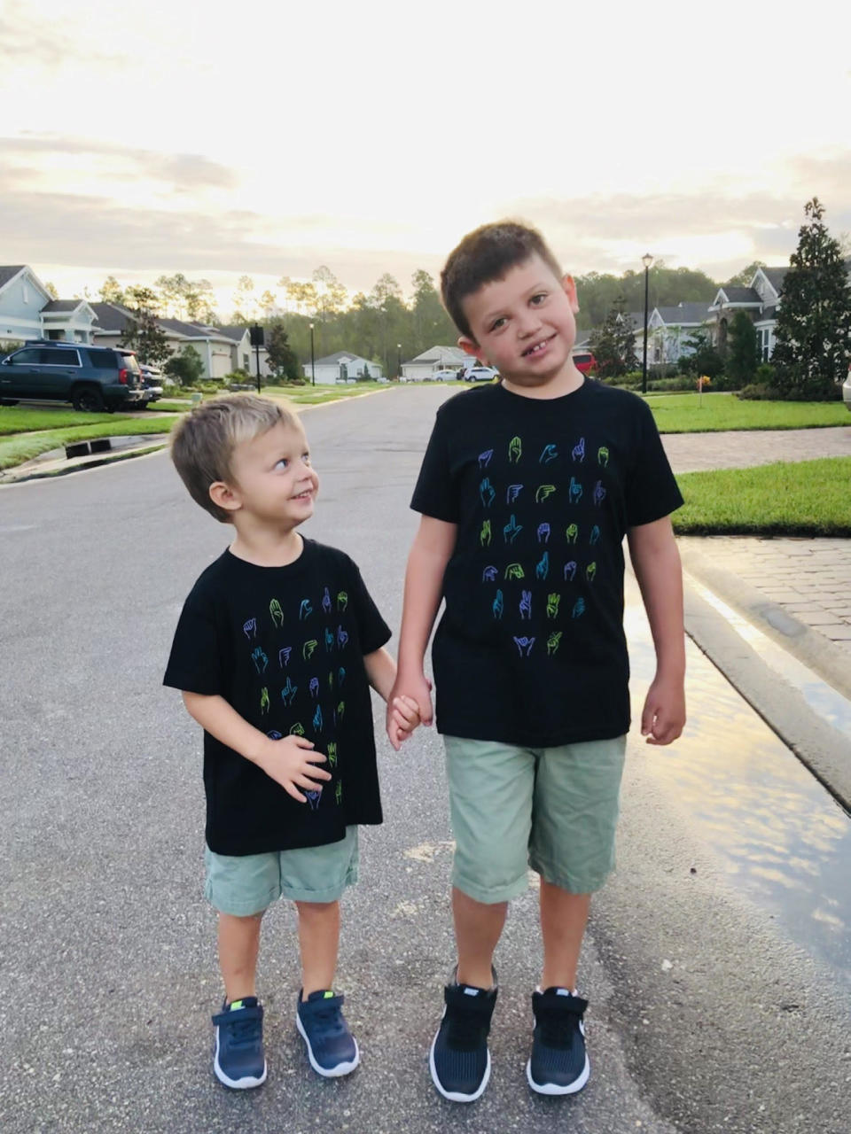 Amanda Cooper's sons Cason (r) and Corbin (l) smile for the camera.  / Credit: Amanda Cooper